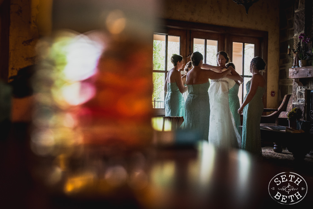 Bride getting in her gown at a Gervasi Vineyard Wedding