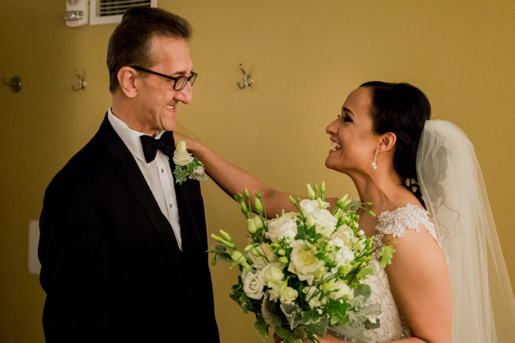 father and daughter see eachother for first time at Beautiful Botanical Garden Wedding 