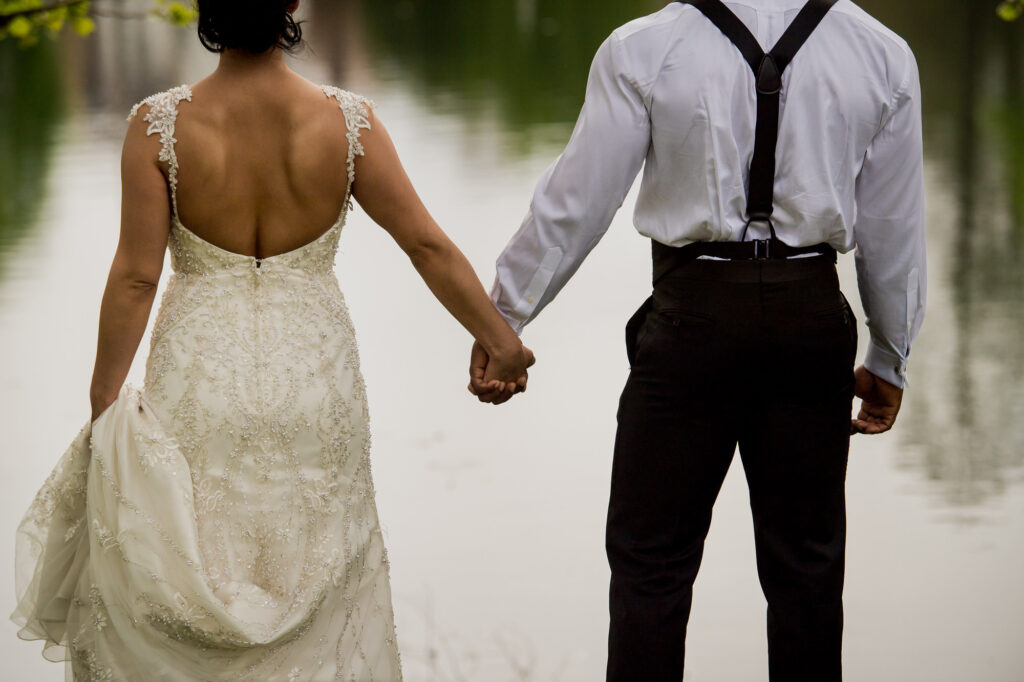 holding hands at Beautiful Botanical Garden Wedding 