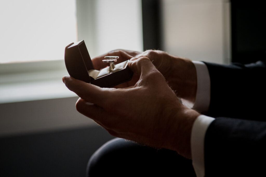 groom holding rings for Columbus Ohio Westin Wedding