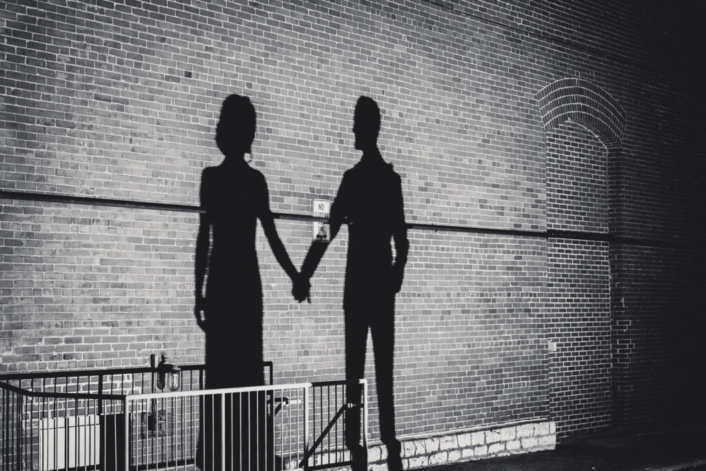 Couple holding hands shadow at columbus ohio westin wedding