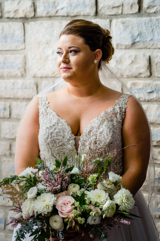 This bride chose monogrammed converse wedding shoes for her reception! Seth and Beth Wedding Photography are Ohio Wedding Photography