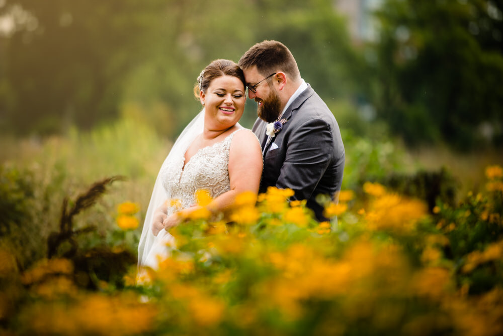 This bride chose monogrammed converse wedding shoes for her reception! Seth and Beth Wedding Photography are Ohio Wedding Photography