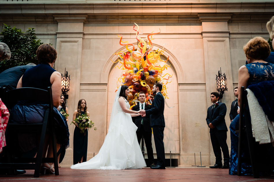 couple standing at alter