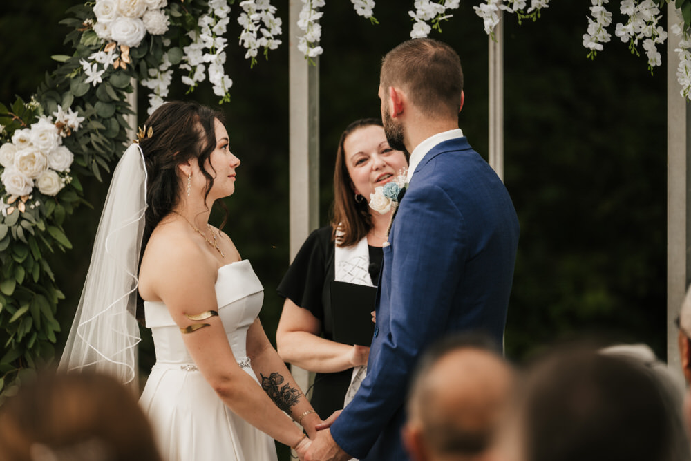 Romantic greenhouse wedding ceremony at Alum Creek Farm